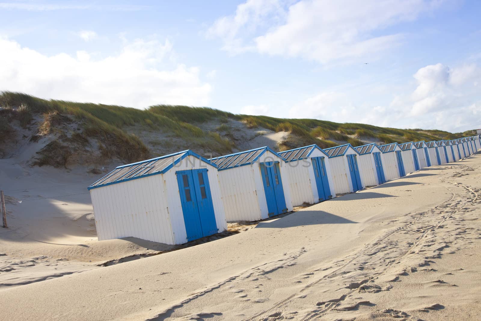 Dutch little houses on beach in De Koog Texel, The Netherlands