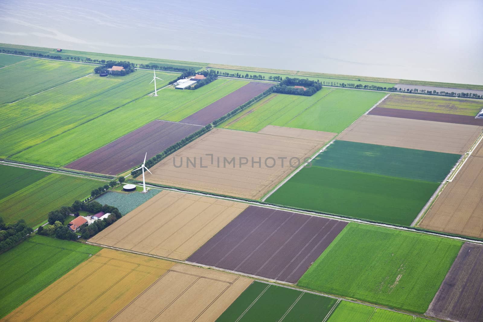 Farm landscape with windmill  from above, The Netherlands