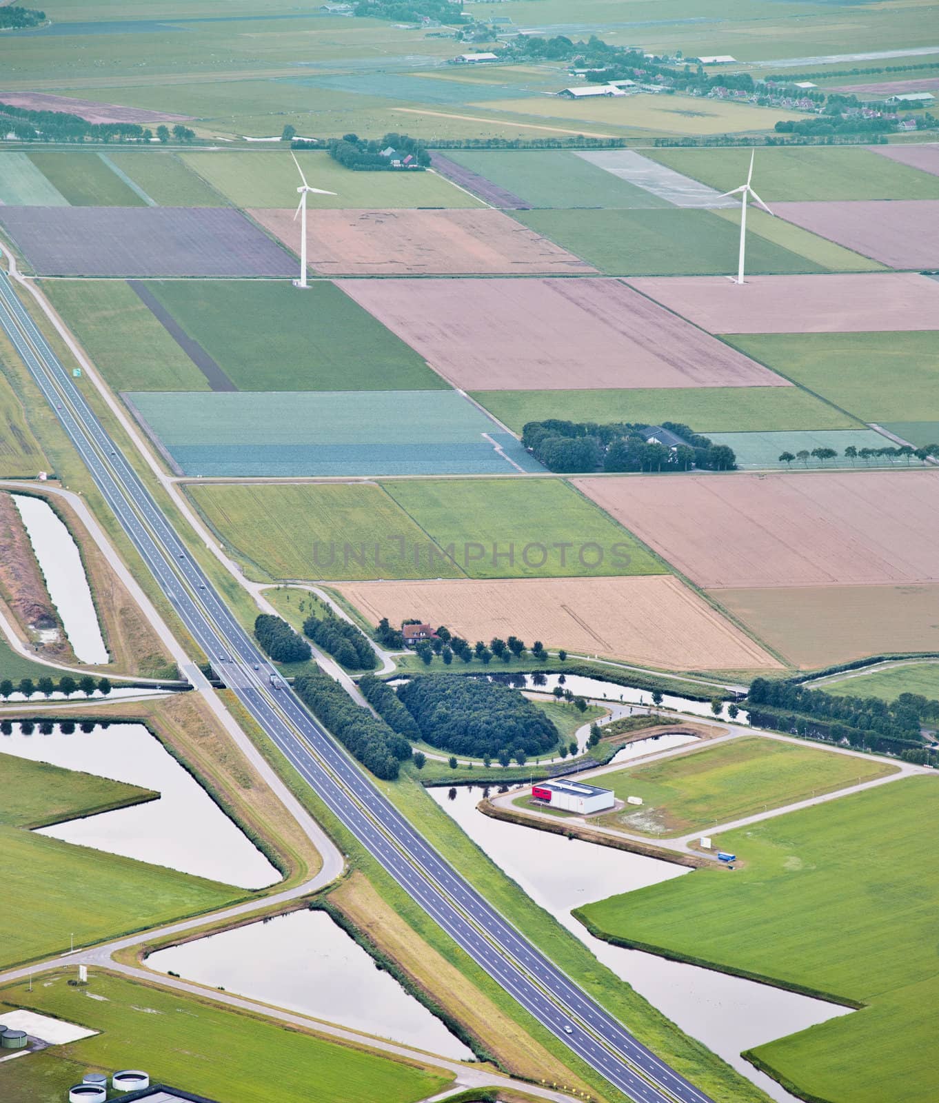 Farm landscape with windmill from above, The Netherlands