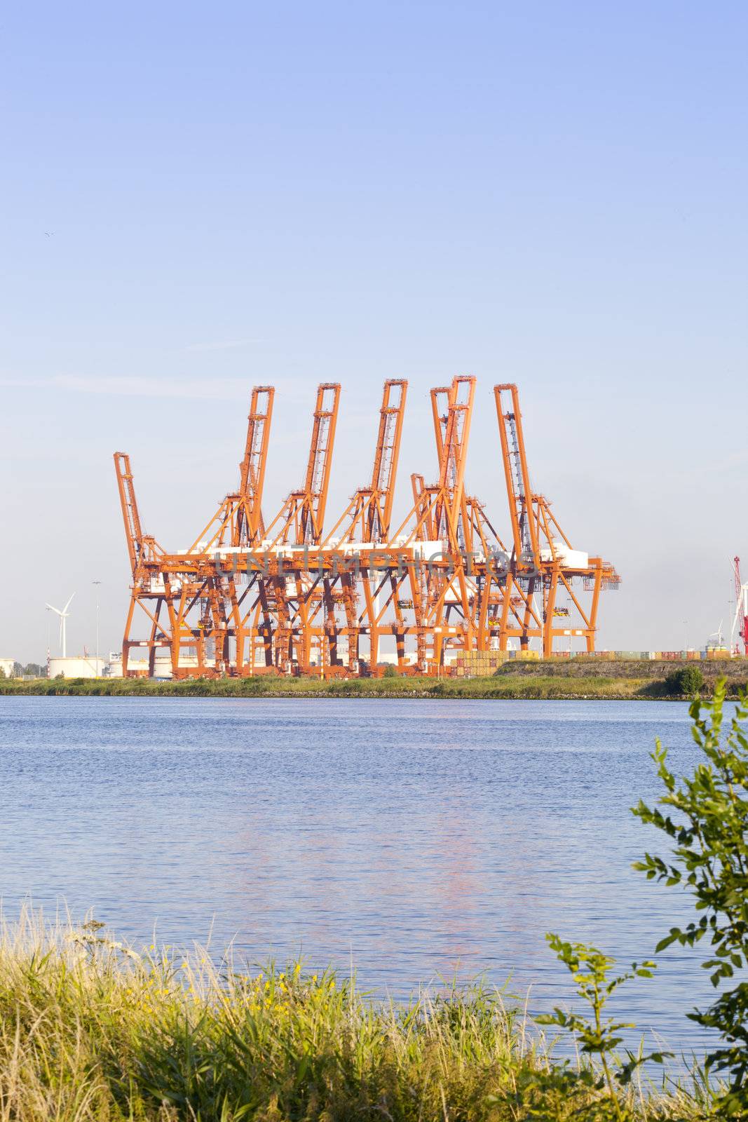 Cranes at harbor of Amsterdam, The Netherlands