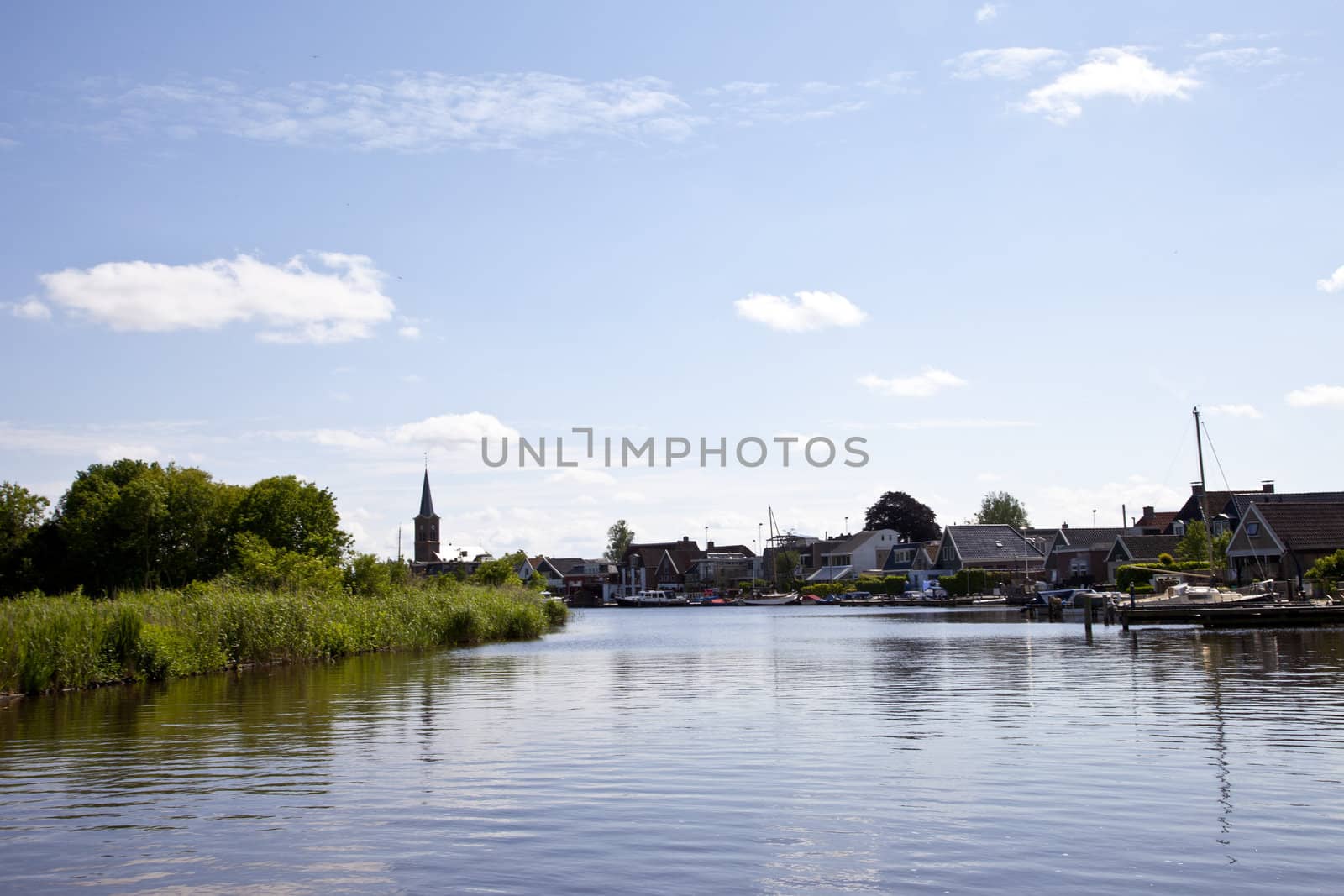 Typical Dutch little village with water