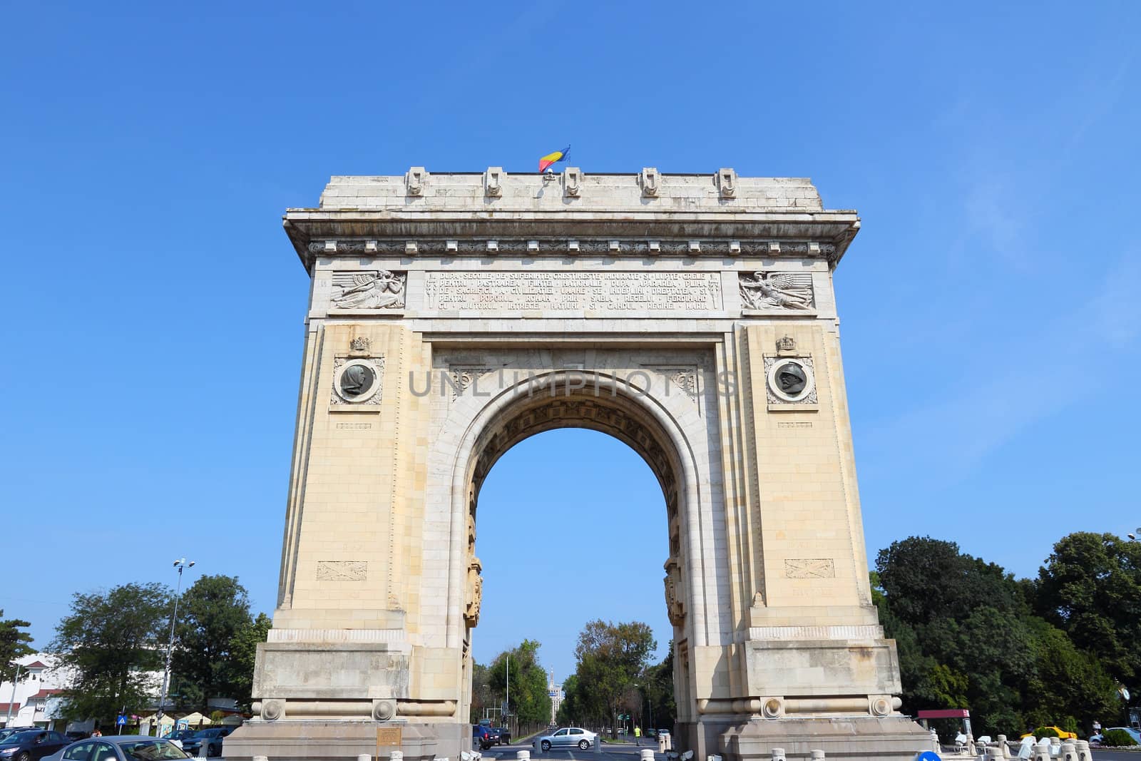 Bucharest, capital city of Romania. Arcul de Triumf - famous triumphal arch.