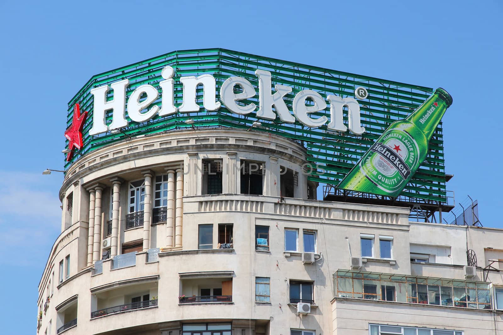 BUCHAREST, ROMANIA - AUGUST 19: Heineken ad on August 19, 2012 on a building in Bucharest, Romania. With 139.2 million hectolitres of beer annually, Heineken is the 3rd largest beer producer worldwide.