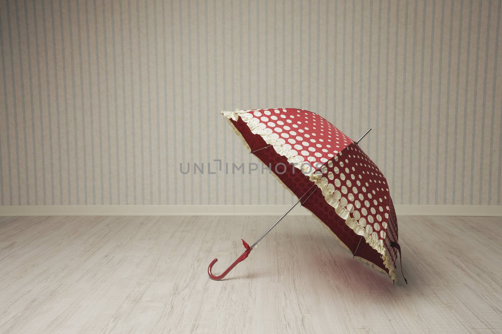 vintage umbrella in an empty room