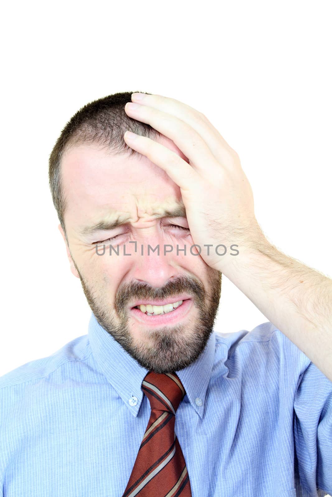 Strong headache - businessman in pain. Young adult near his 30s - portrait isolated against white background. Short-haired male.