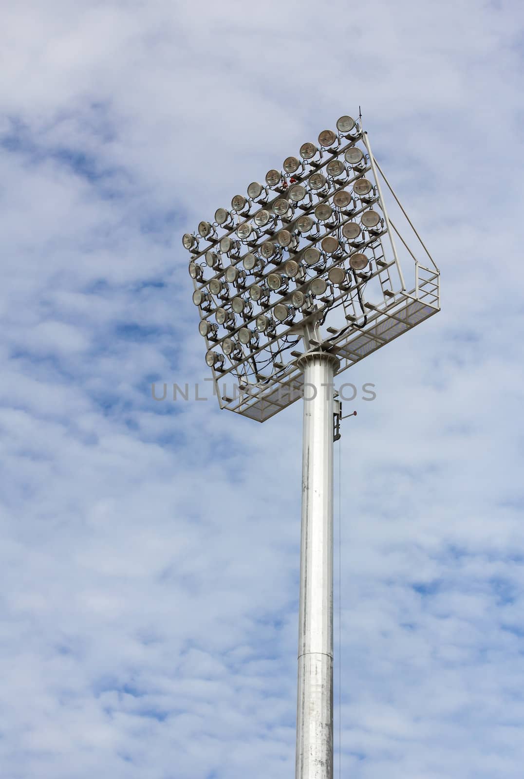 The Stadium Spot-light tower over Blue Sky