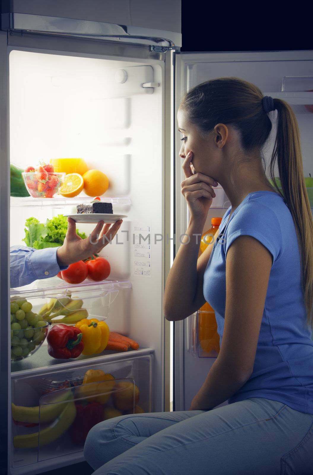 Woman contemplating if she should ruin her diet