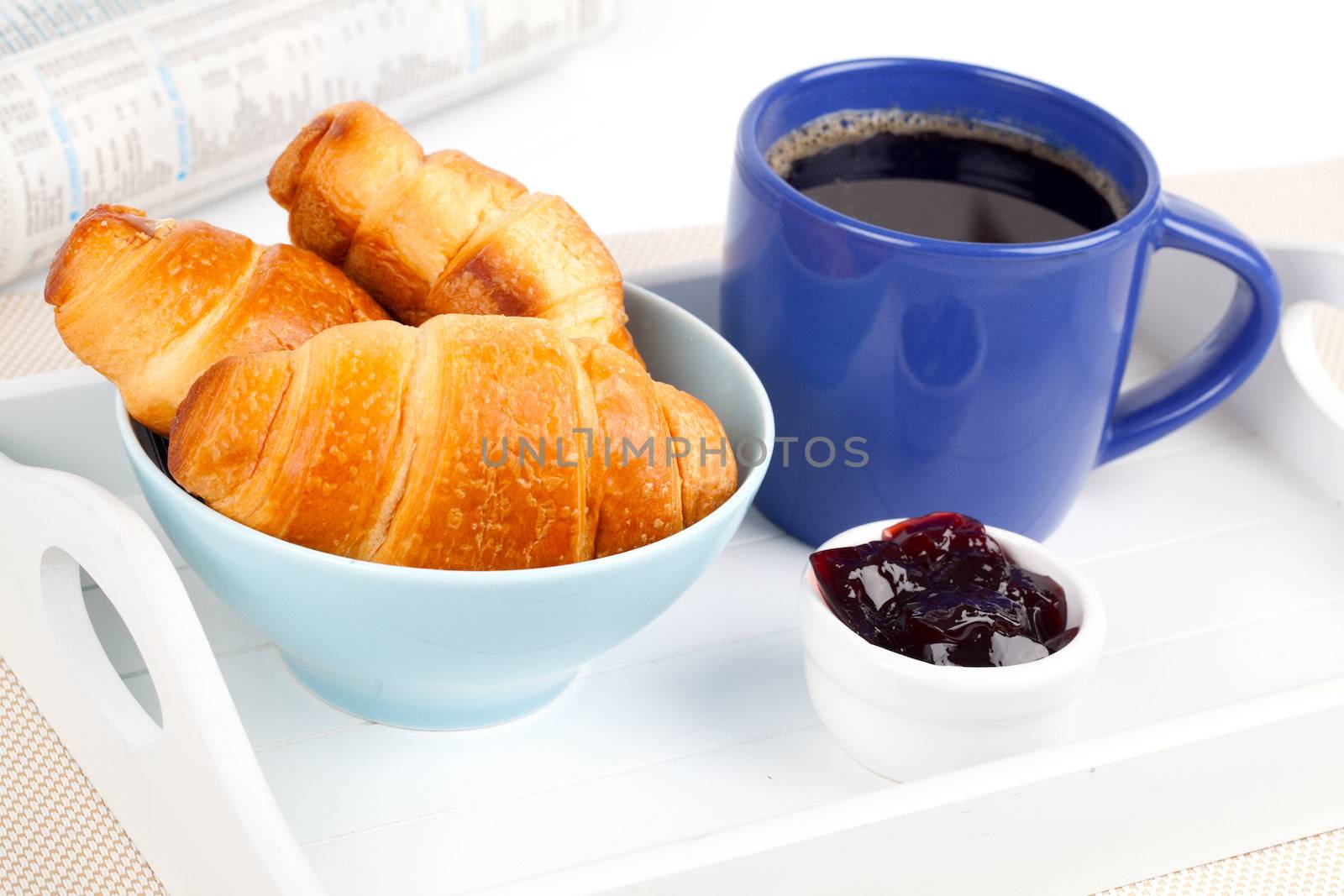 breakfast with croissant, jam and coffee
