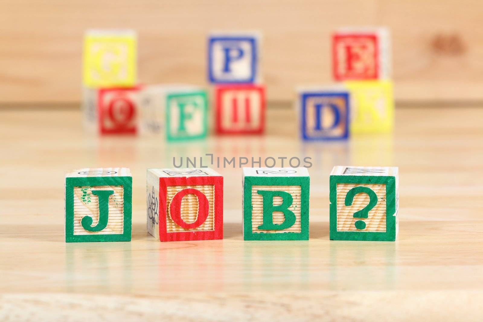 Wooden blocks with letters. Children educational toy concept - thinking about job in kindergarden.