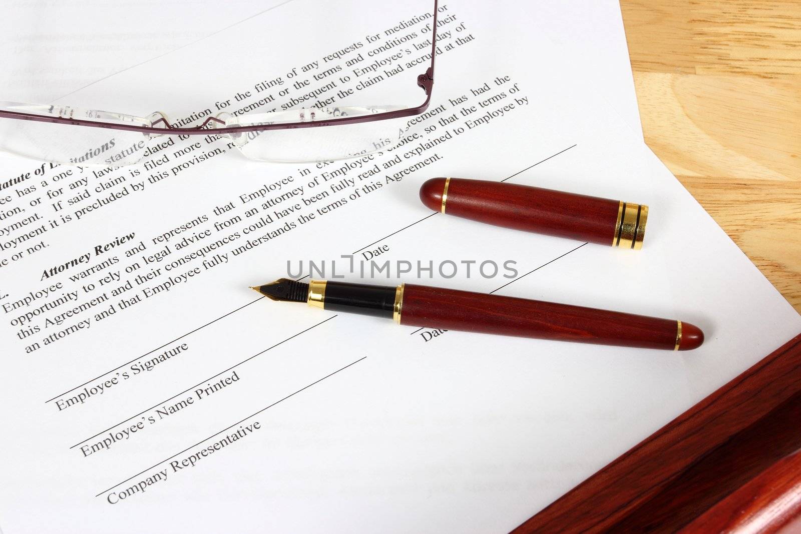 Business objects - full time employment contract ready to sign with ink pen.