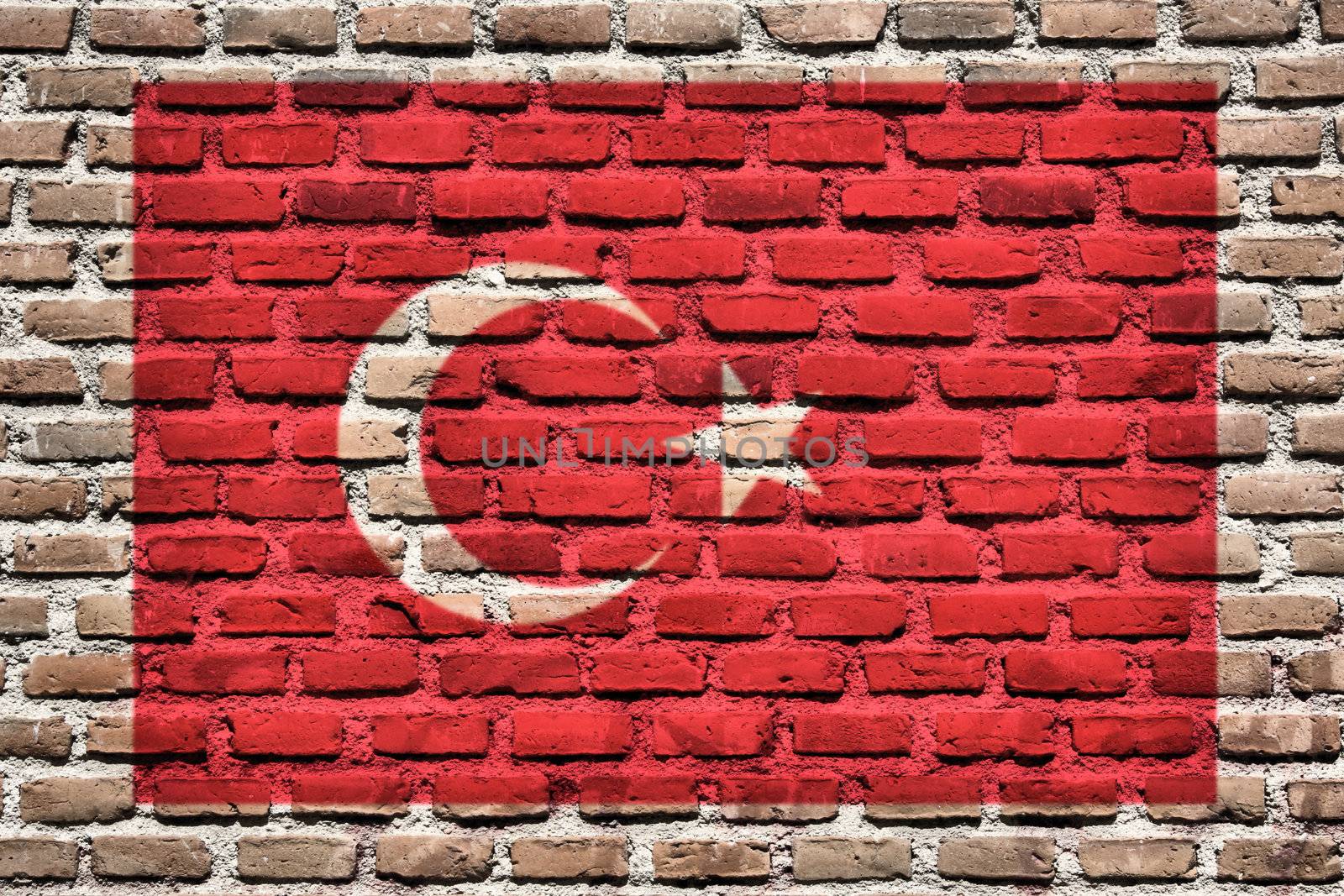 Turkey national flag spray painted on a brick wall. Grunge graffiti.