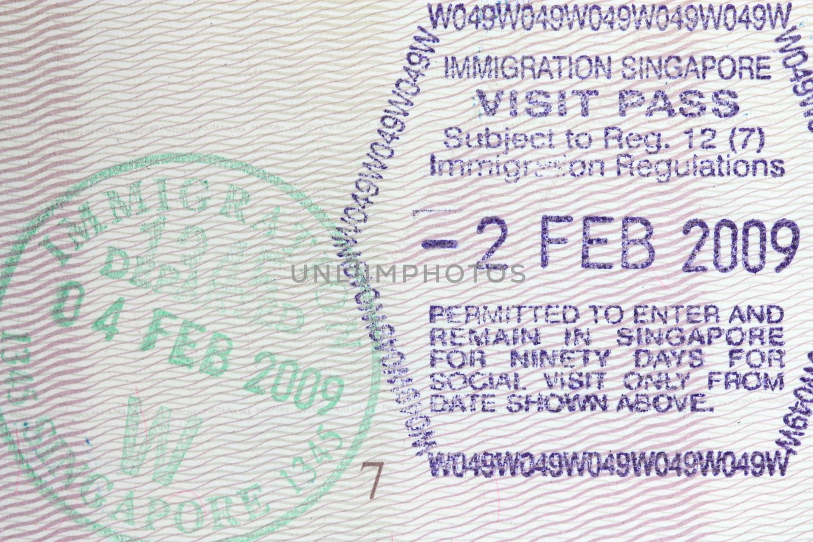 Stamps from Singapore border in a Polish passport