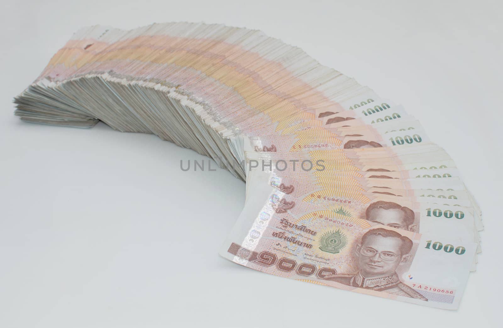 Stack of thai banknotes, one thousand bath type.