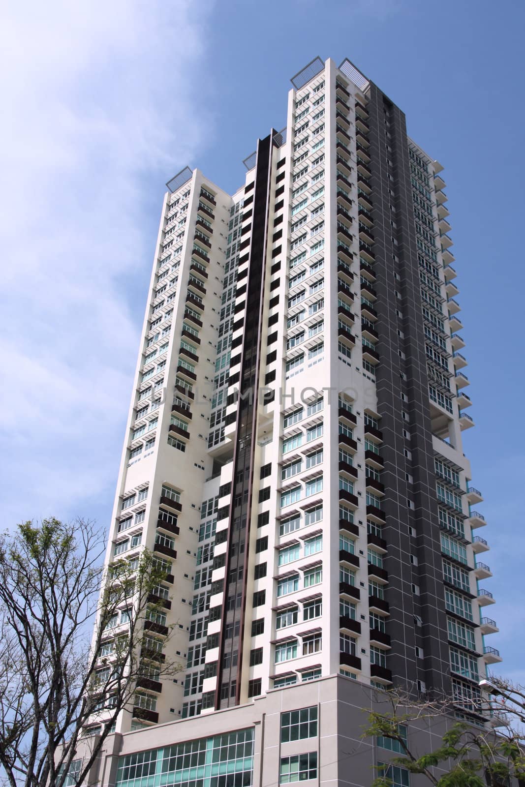 Tall apartment building in Georgetown, Penang Island, Malaysia. Modern residential architecture.