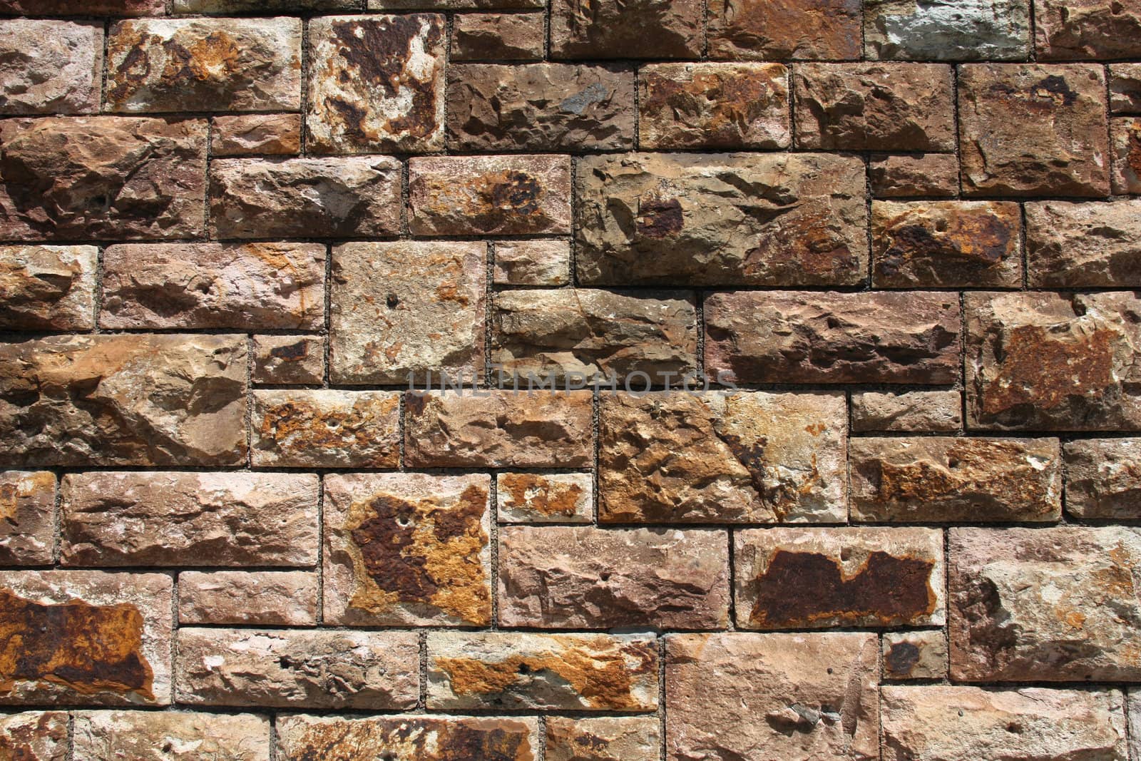 Stone wall background texture. Abstract pattern photo.