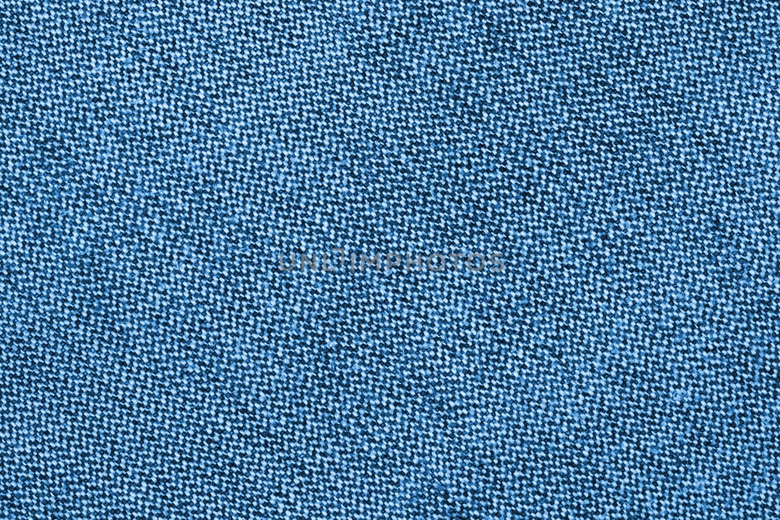 Jeans fabric background texture. Blue textile abstract.