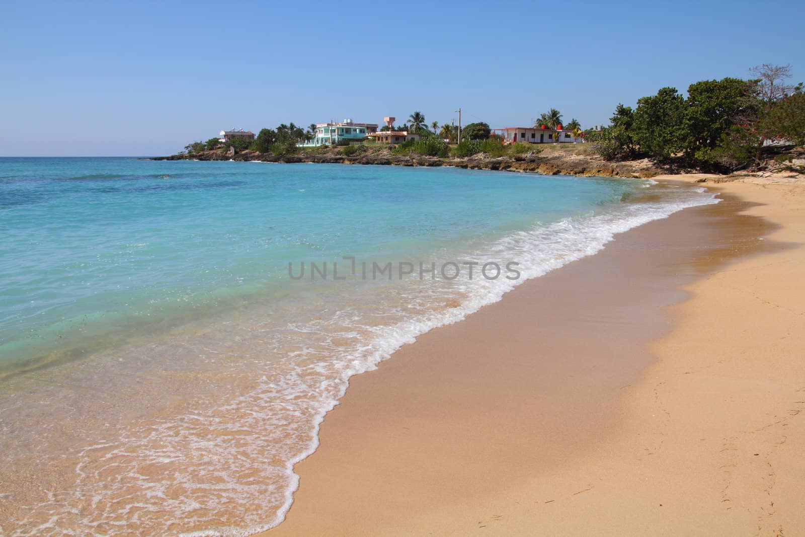 Cuba - Caribbean beach Playa Rancho Luna in Cienfuegos. Sandy coast.