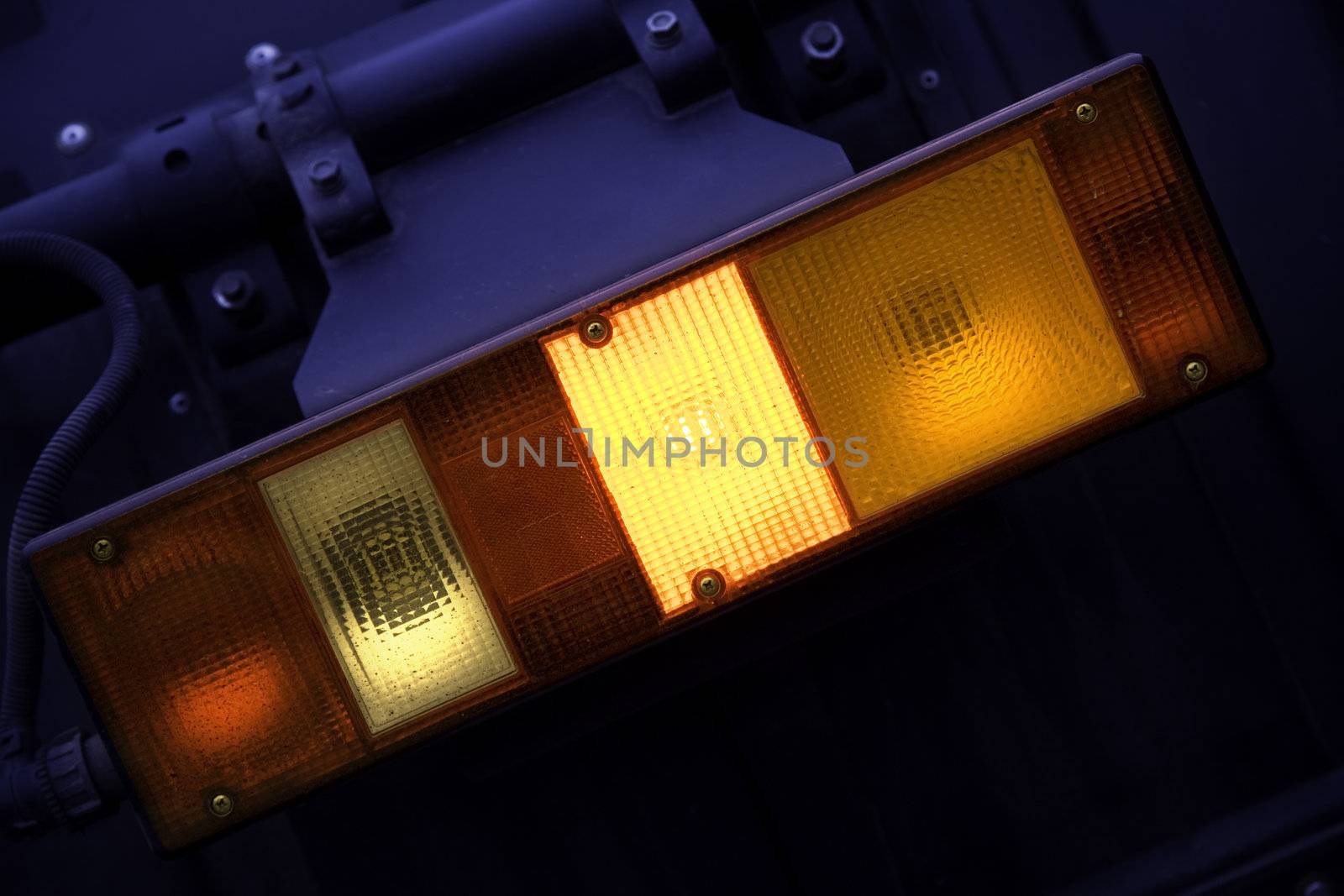 Closeup of car headlight by Kuzma