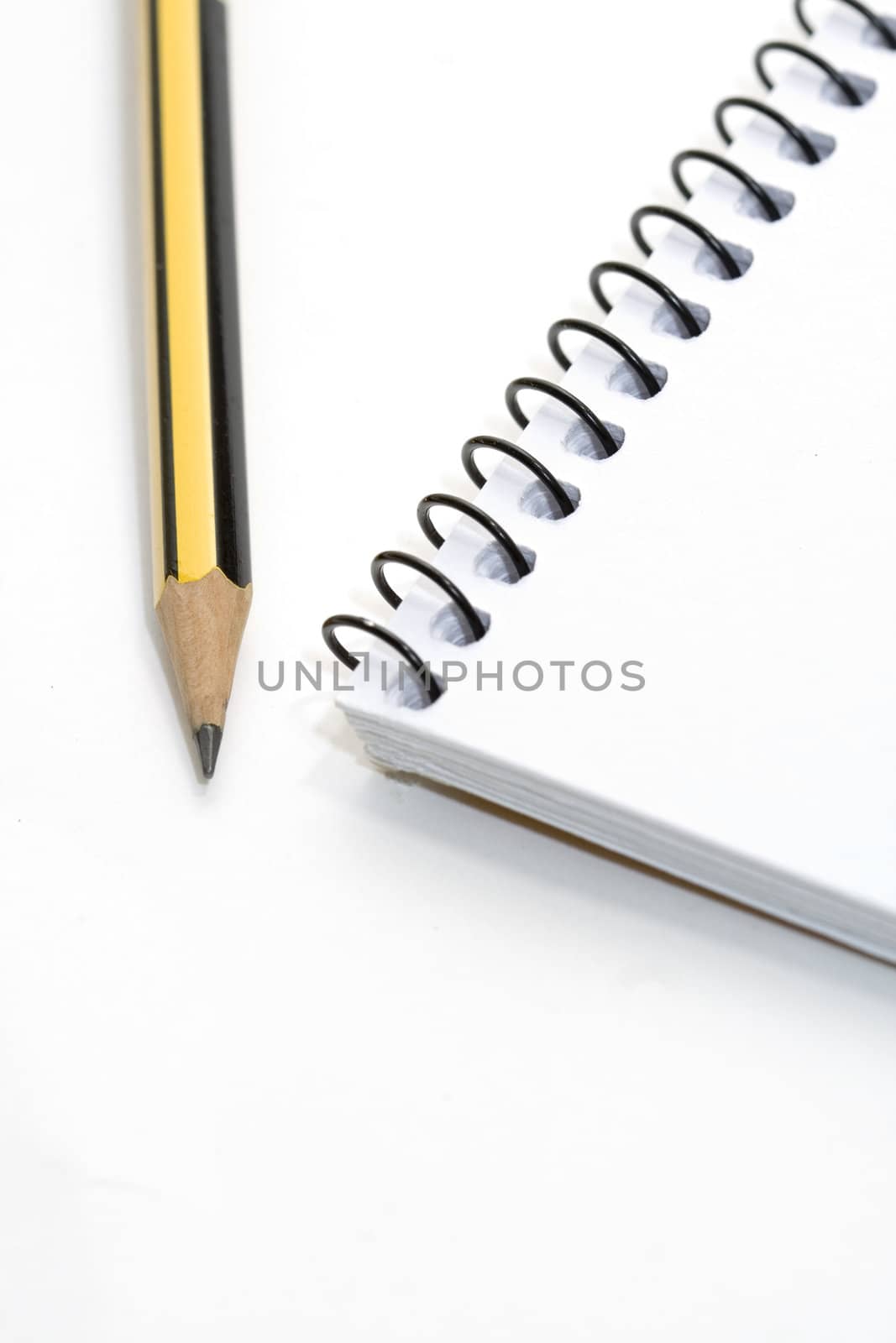 a pencil and a note-book to write important things