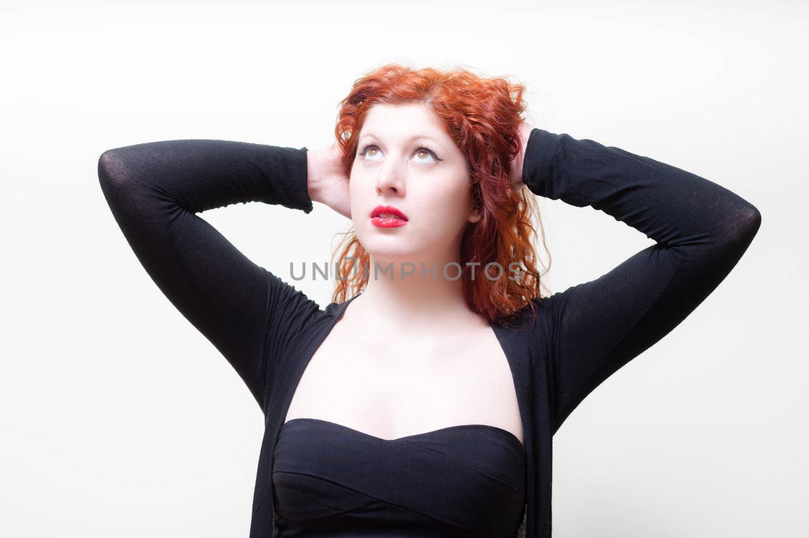 beautiful red hair and lips girl on white background