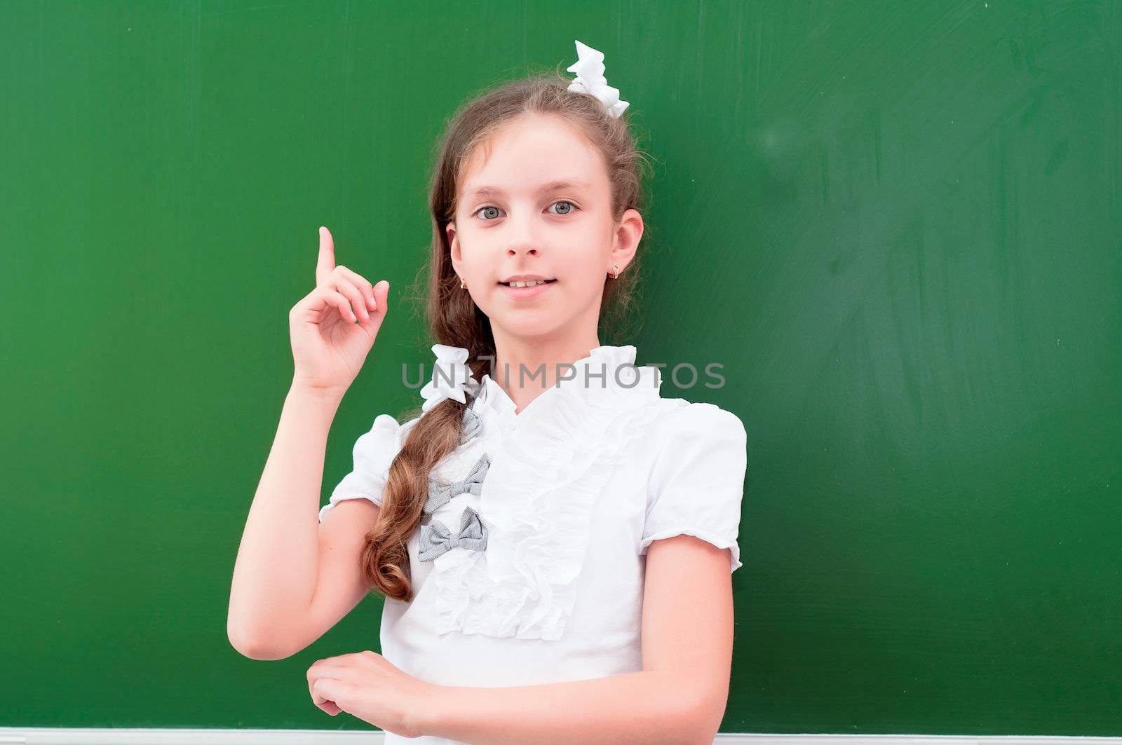 schoolgirl portrait near the blackboards by adam121