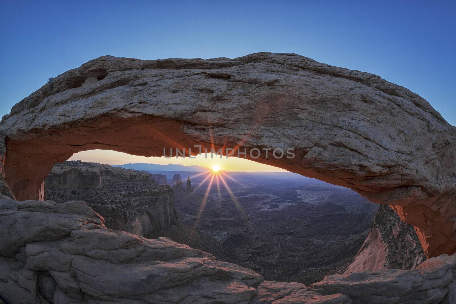 Famous sunrise at Mesa Arch in Canyonlands National Park, Utah, USA 