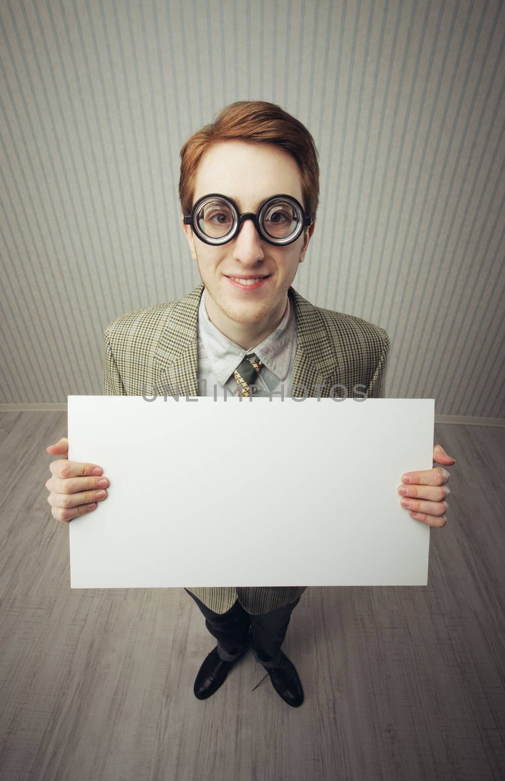 Business man nerd holds a blank sign, ready for your text, old style image