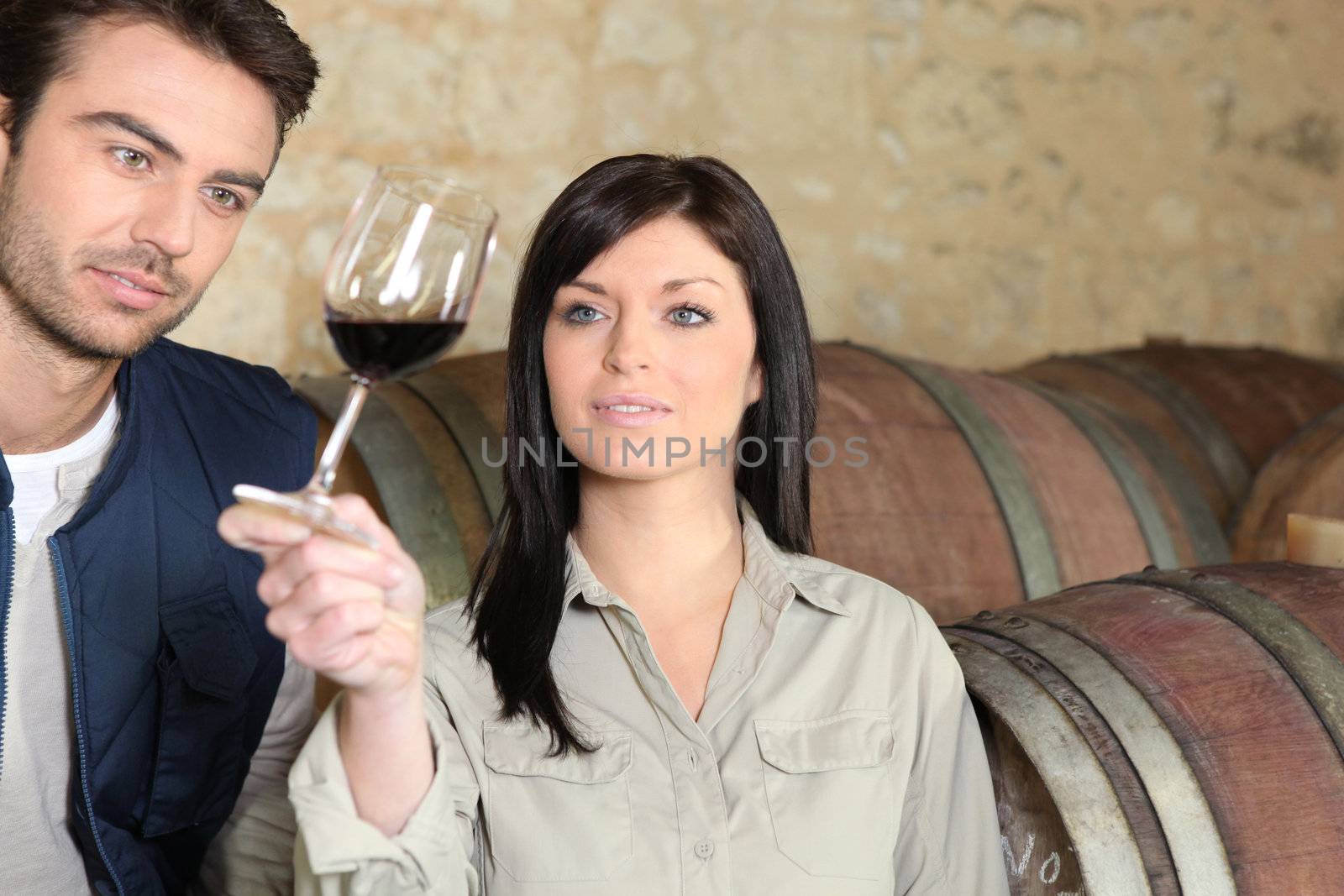 Couple in a cellar tasting wine Dubroca_Joffrey_140410;Bounie_Audrey_140410 by phovoir
