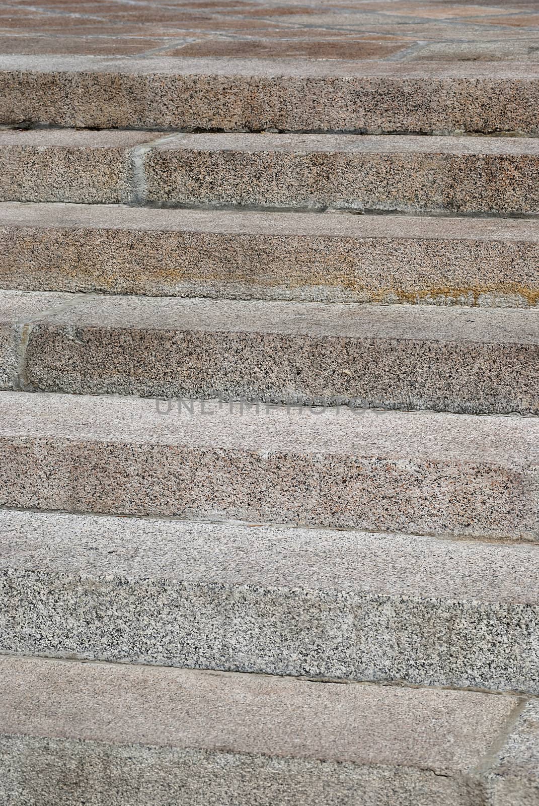 Granite stone stairs closeup in sunny day as background