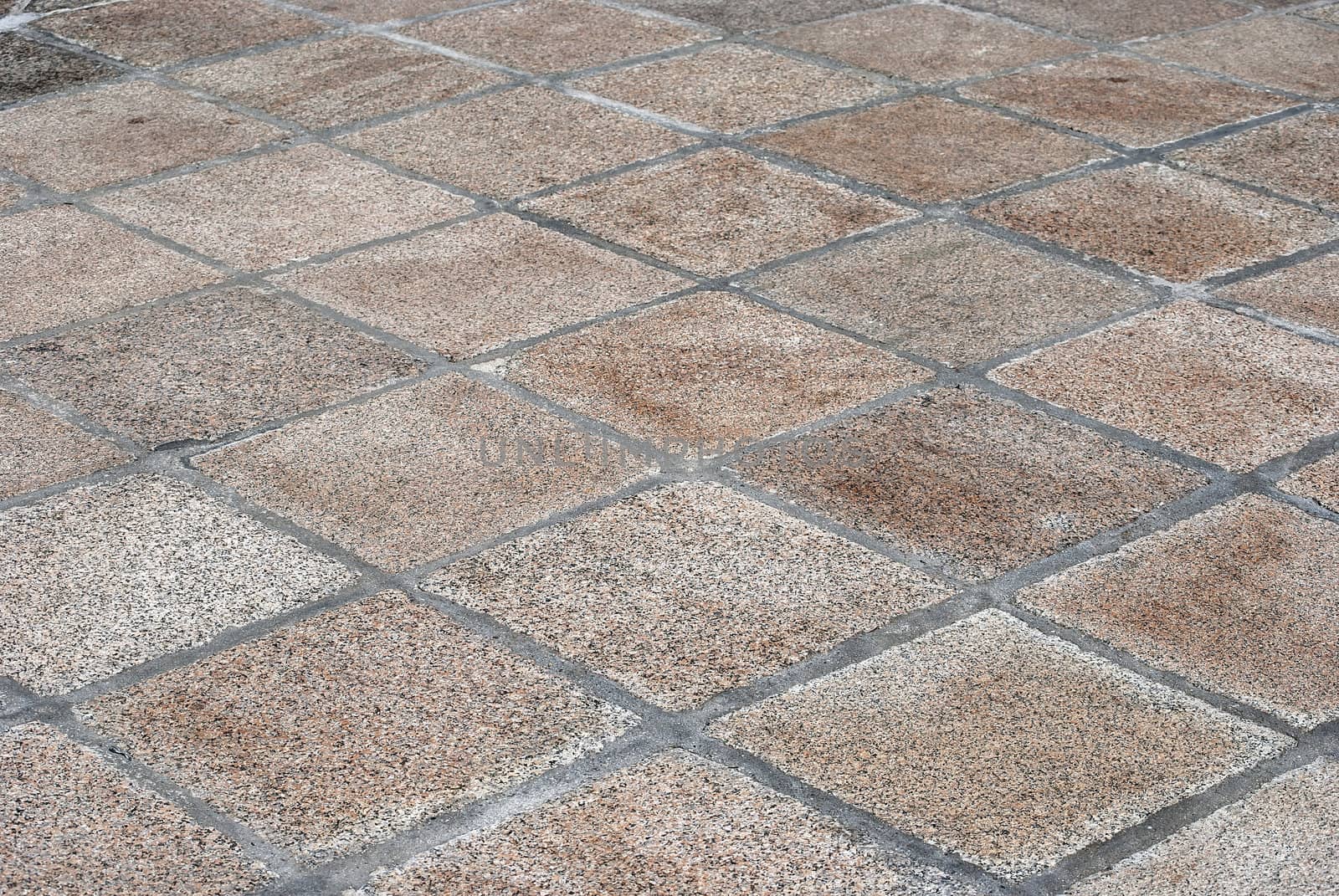 Pavement stone tiles close up as background