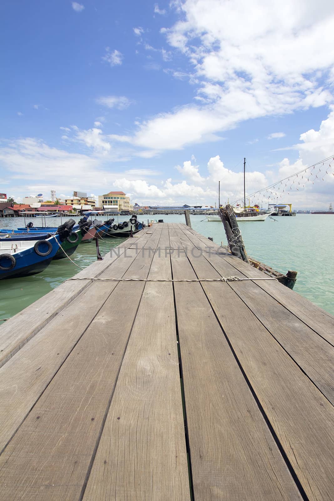 Boat Dock on Chew Jetty in Penang Malaysia with Blue Sky