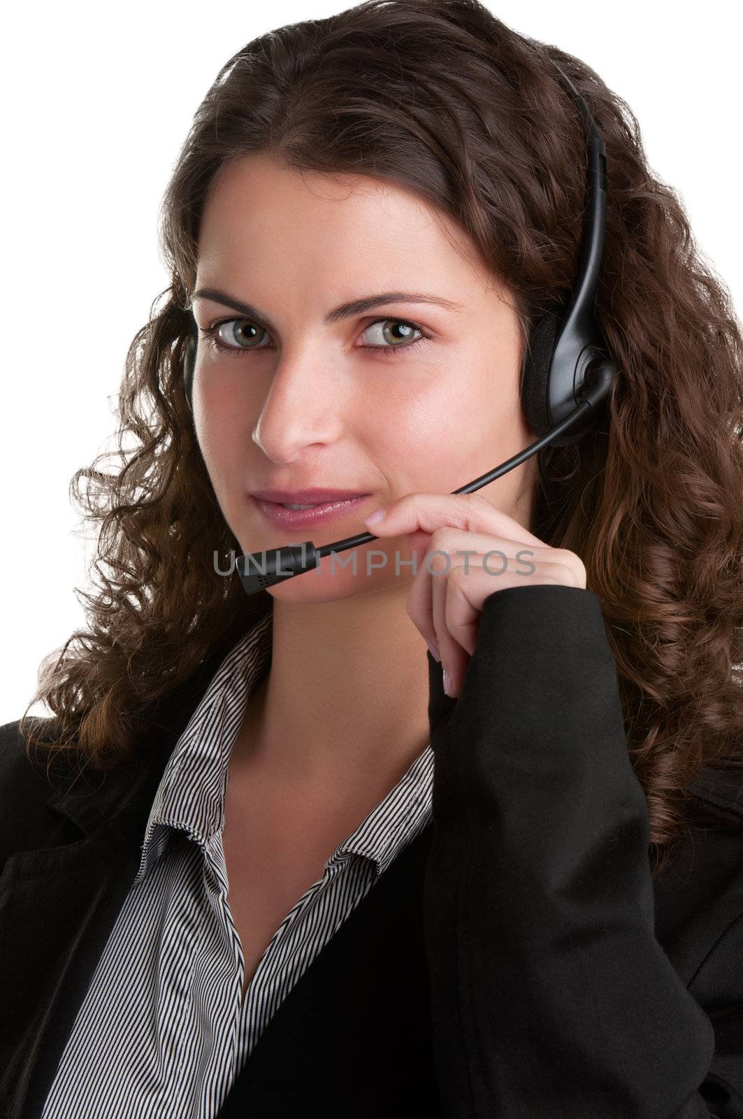 Corporate woman talking over her headset, isolated in a white background