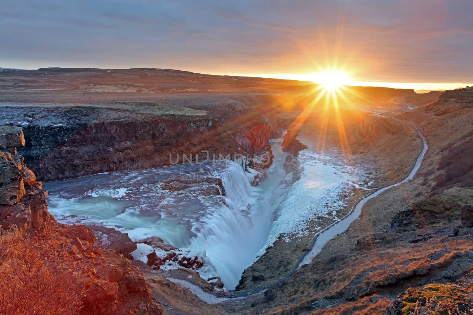 Gullfoss waterfall at sunset in Iceland during winter