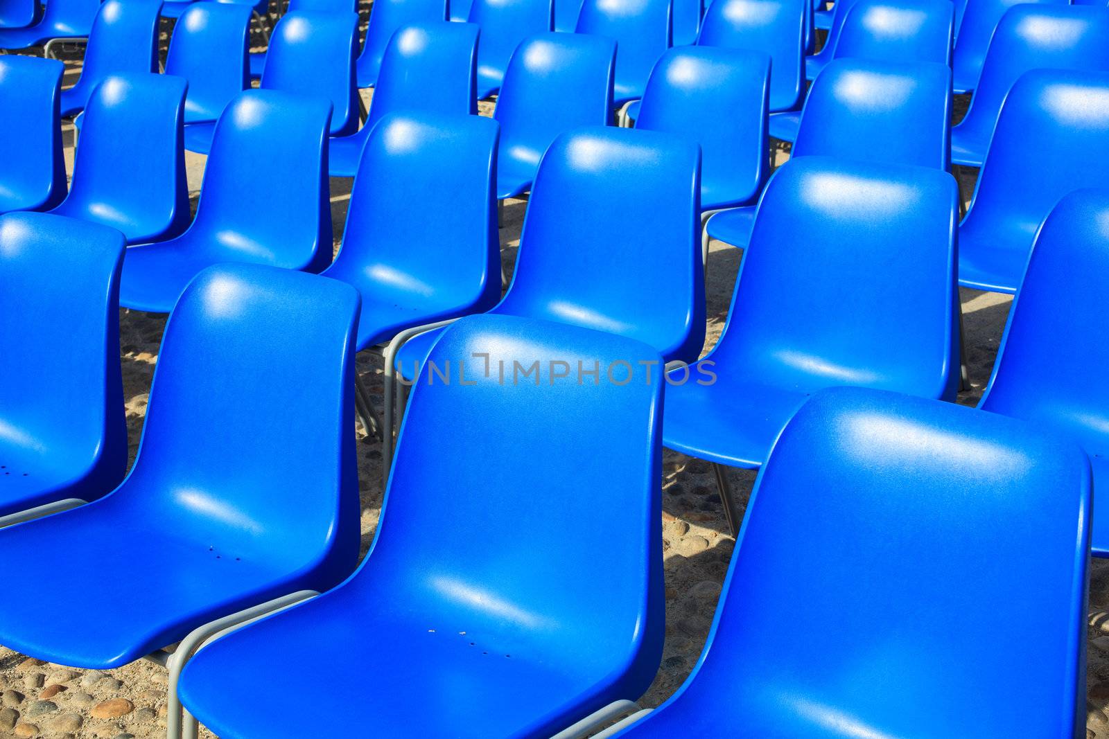 View of Empty blue chairs for outdoor cinema