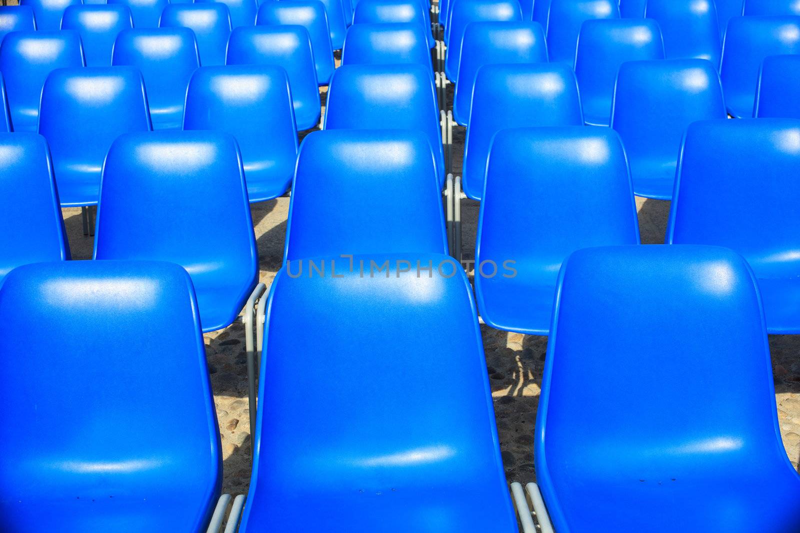 View of Empty blue chairs for outdoor cinema