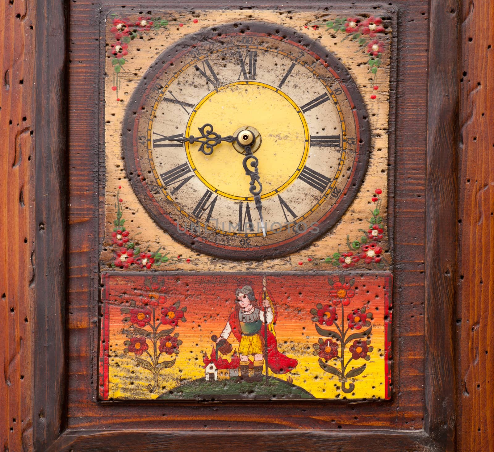 Close up of an old wooden Clock