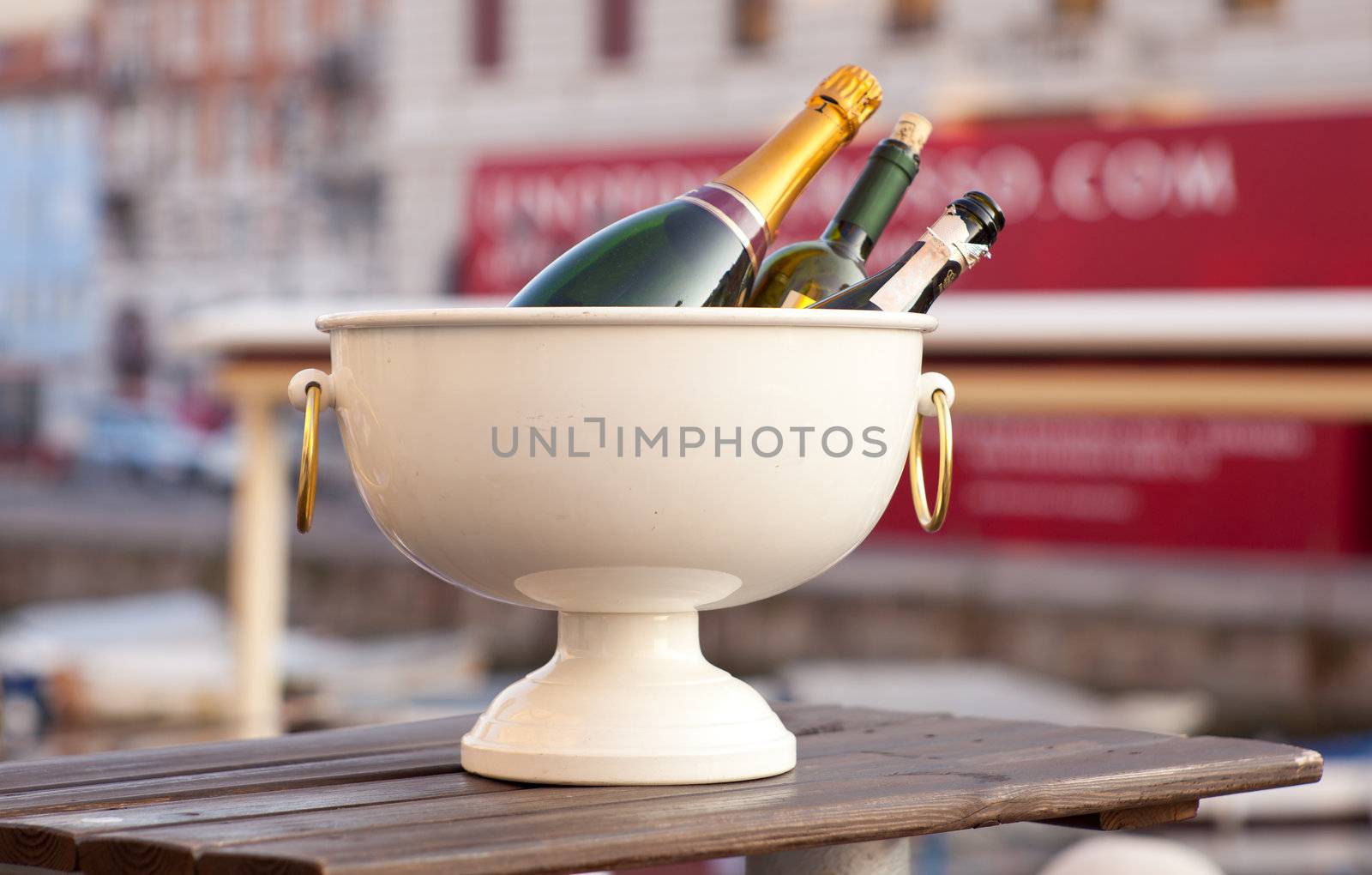 Bottles of sparkling wine in a tub with ice