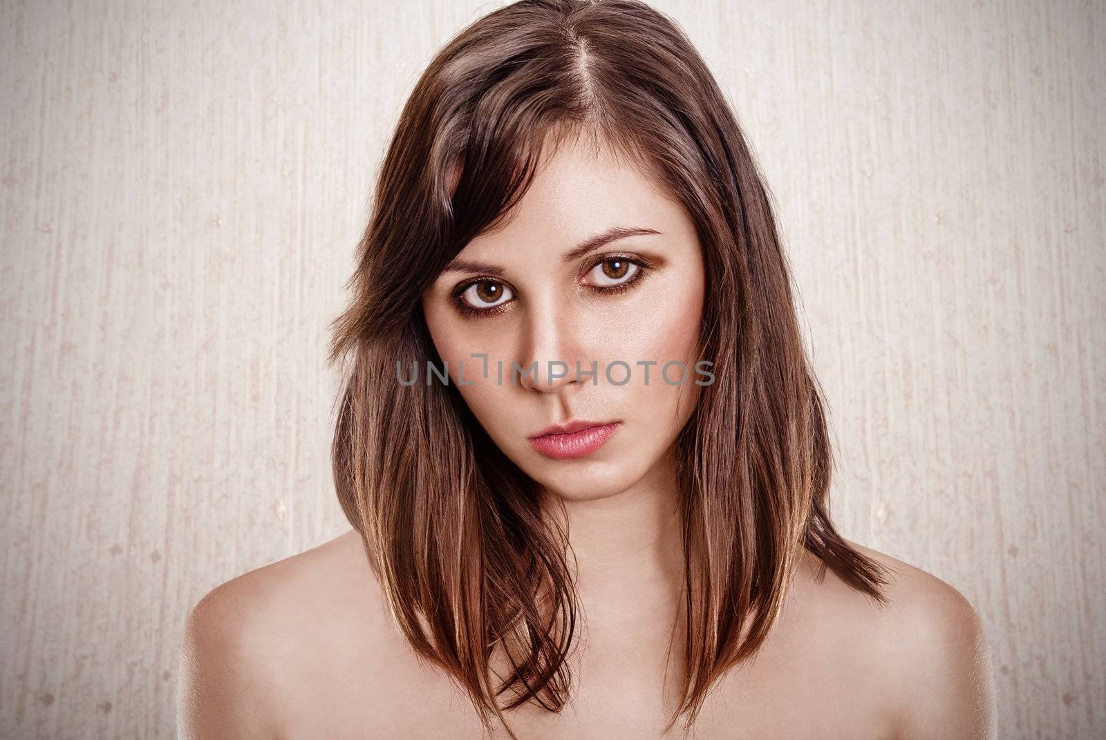 Fashion portrait attractive brunette. Fashion studio shot. Vignette image