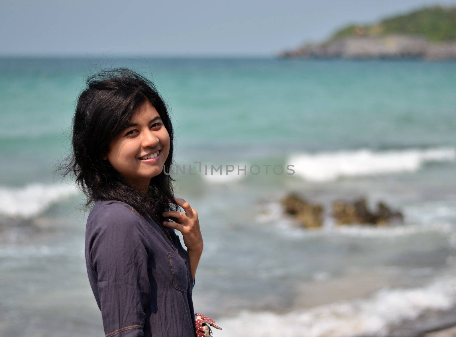 Beautiful young asian woman on beach summer holiday