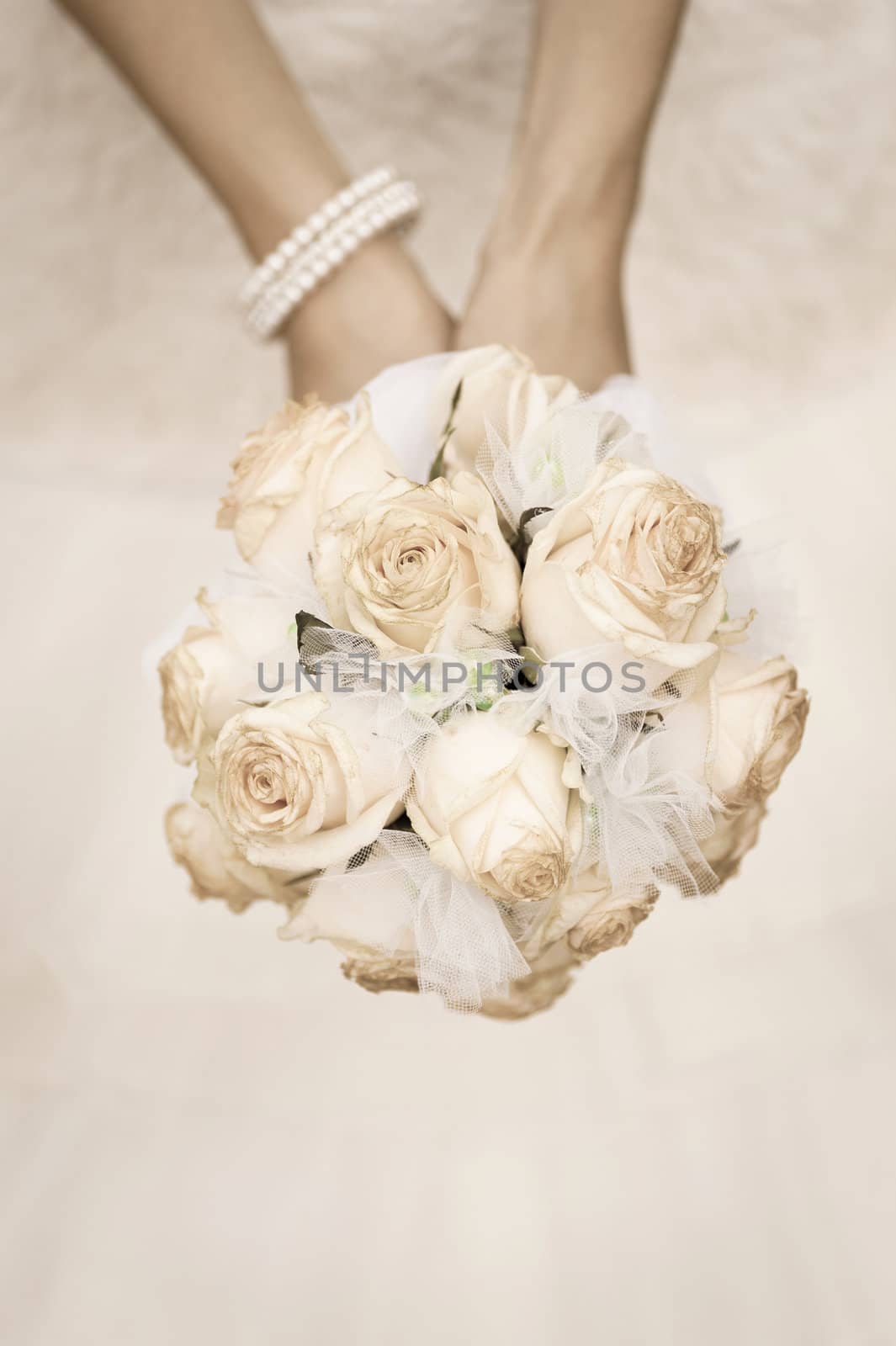 beauty wedding bouquet of roses in a bride hands. retro style