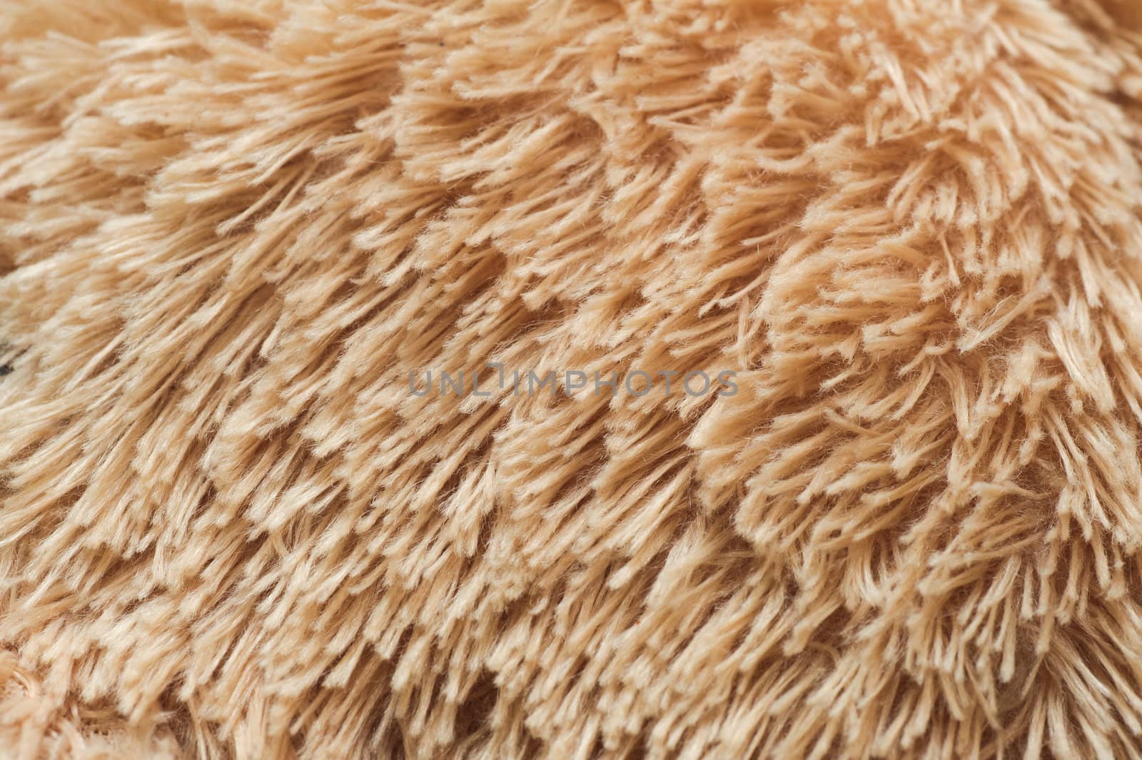soft hair texture similar to natural wool. artificial fibre background