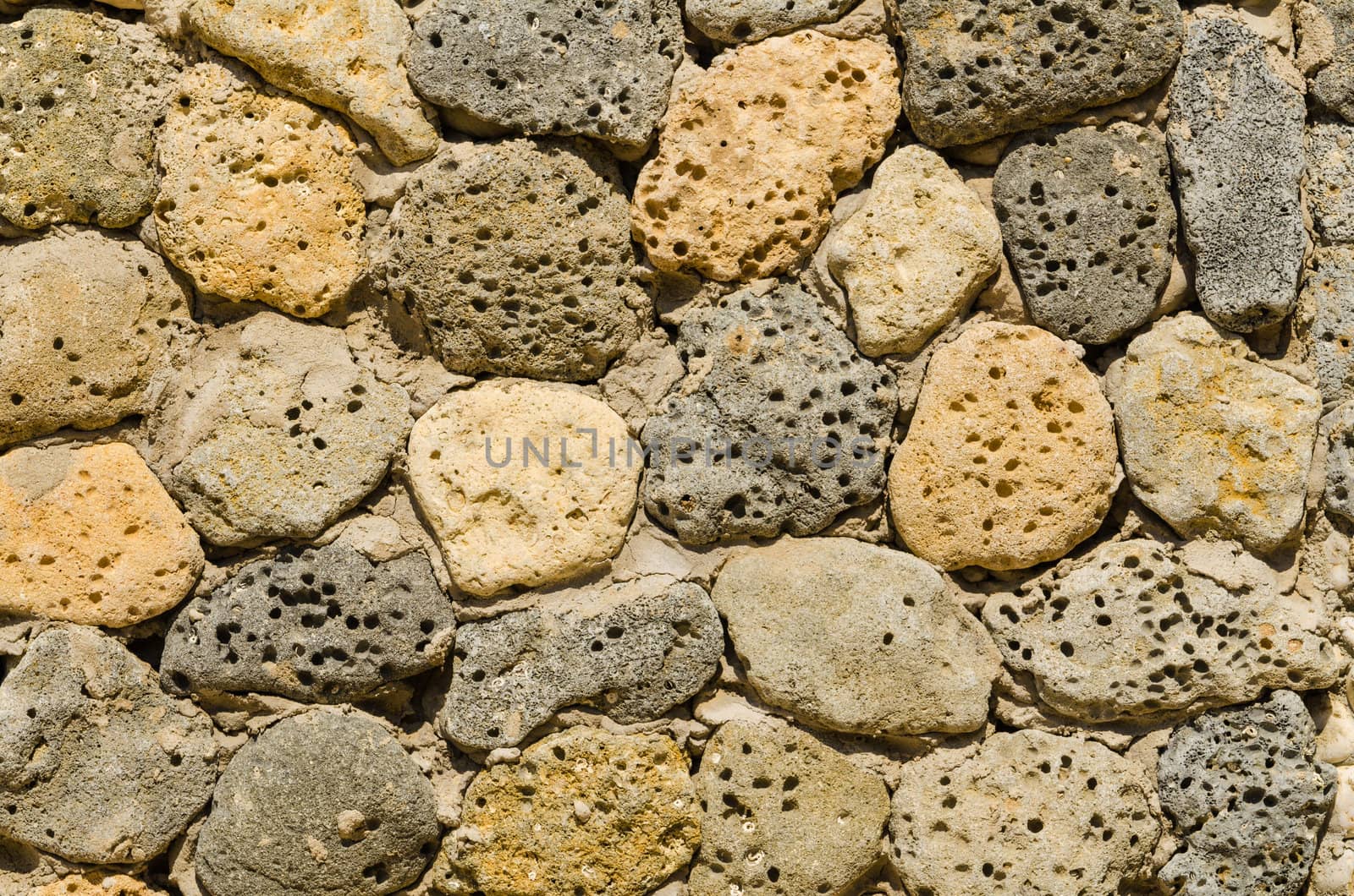 masonry of hole stones. Natural texture