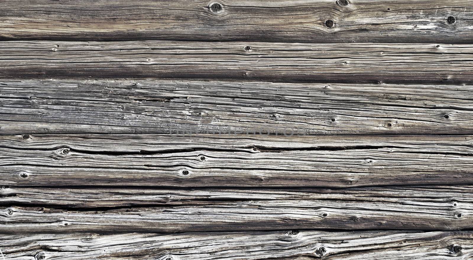 Close up of old weathered log wall