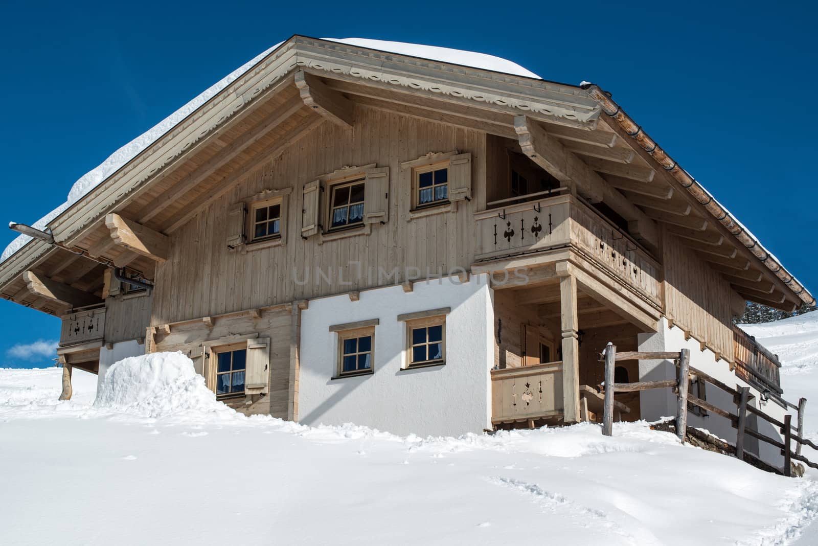 Beautiful skiing hut in a valley of Montafon, photo taken from public skiing piste