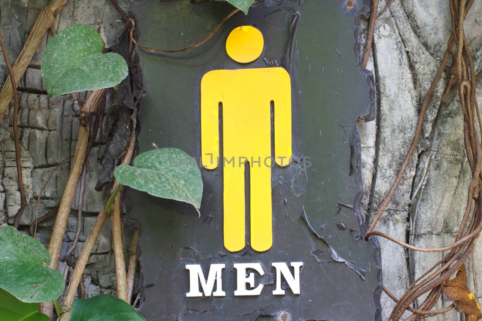 This male and female bathroom sign made ​​out of steel