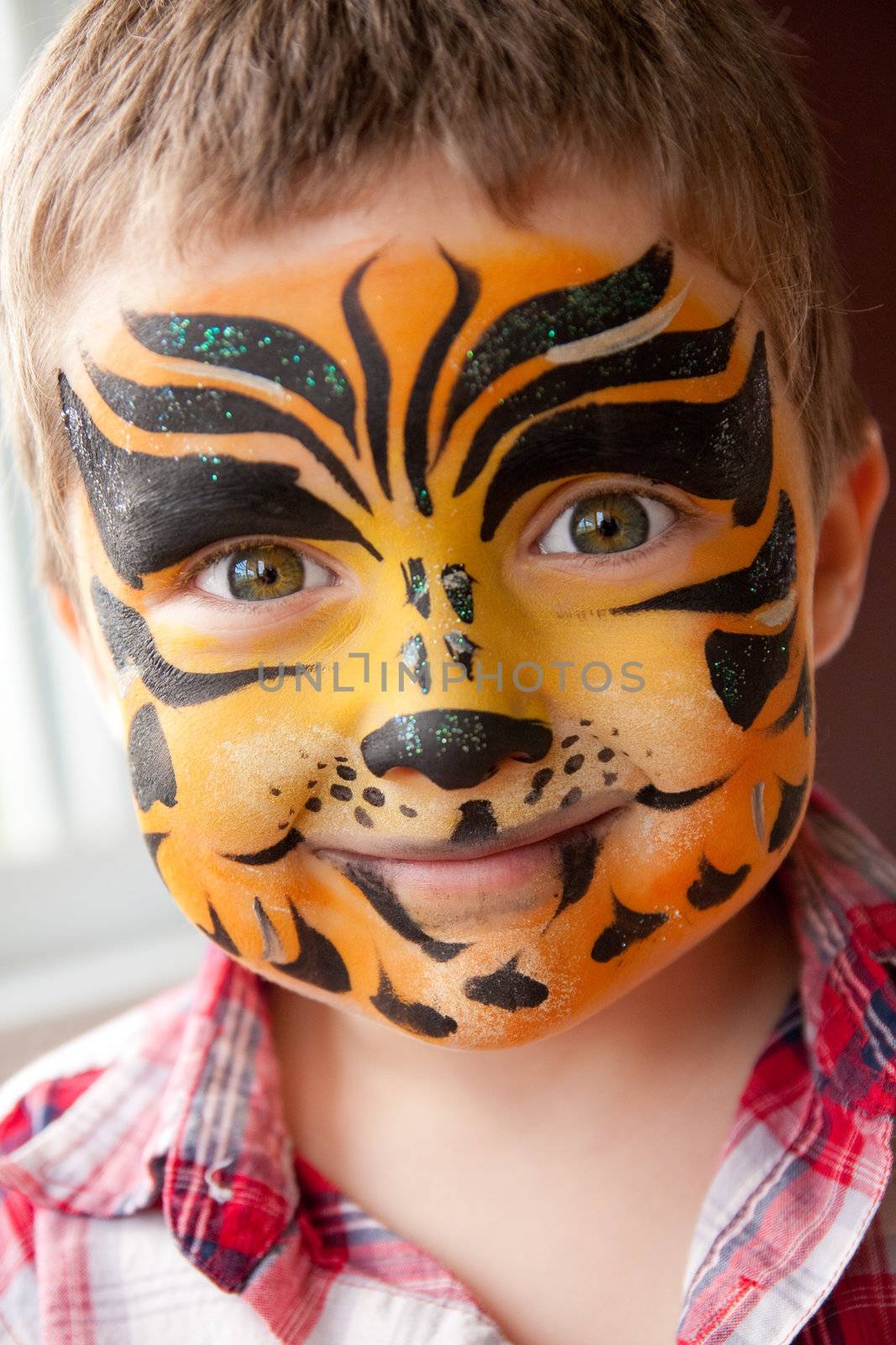 Boy with a tiger make-up by Talanis