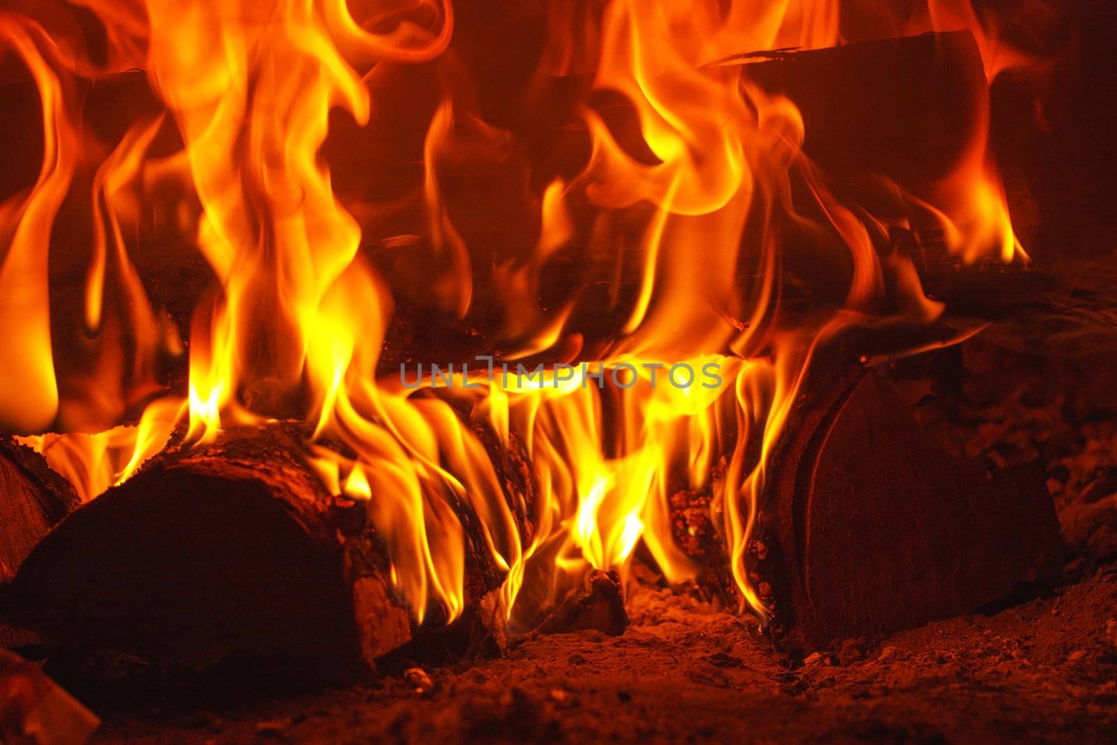 Fire in fireplace by shebeko
