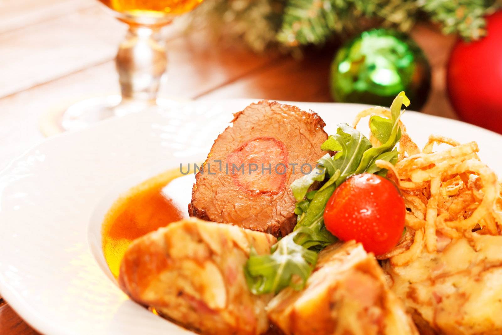 roasted meat on Christmas table by shebeko