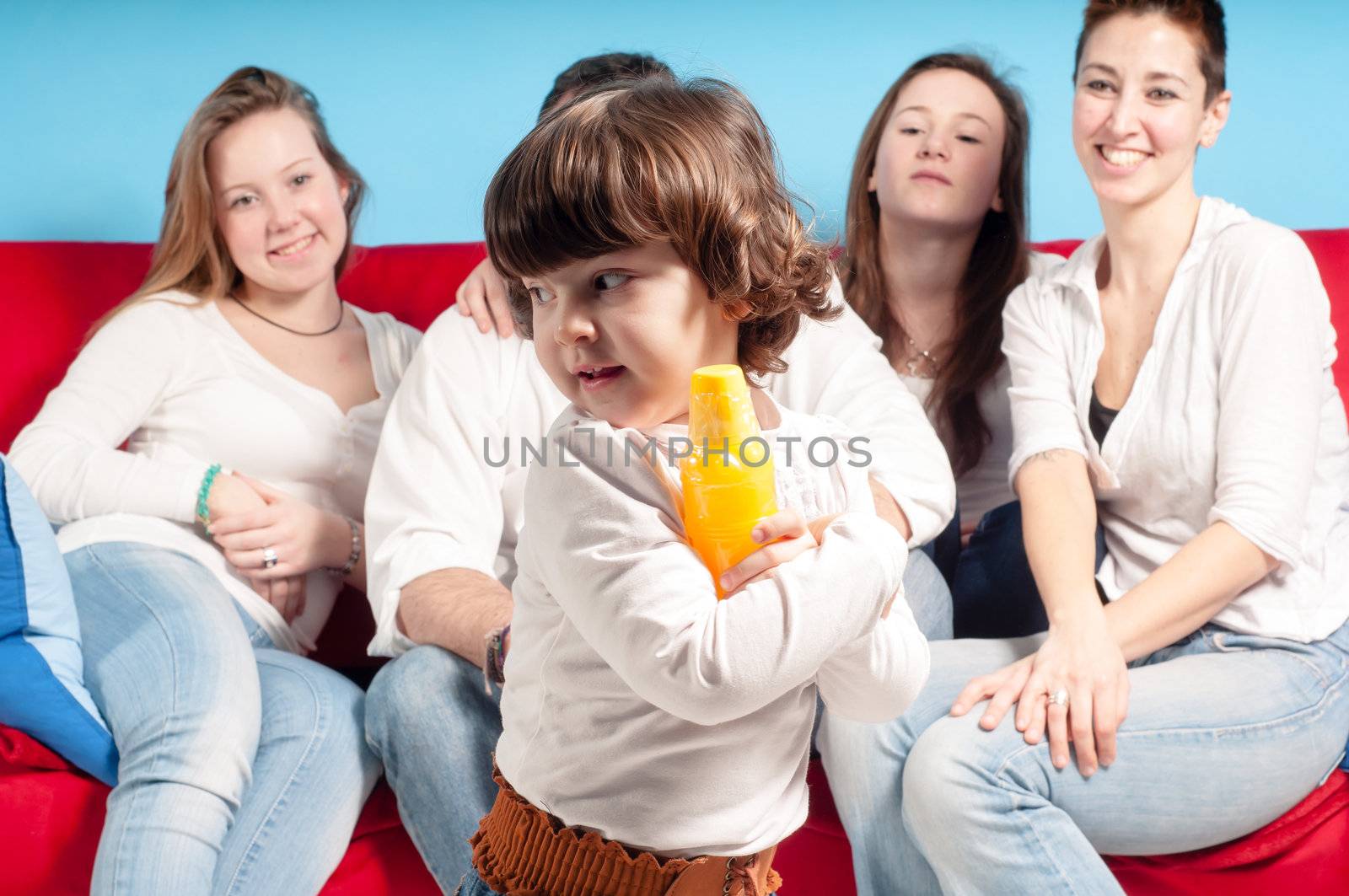 happy family looking child playing in the living room