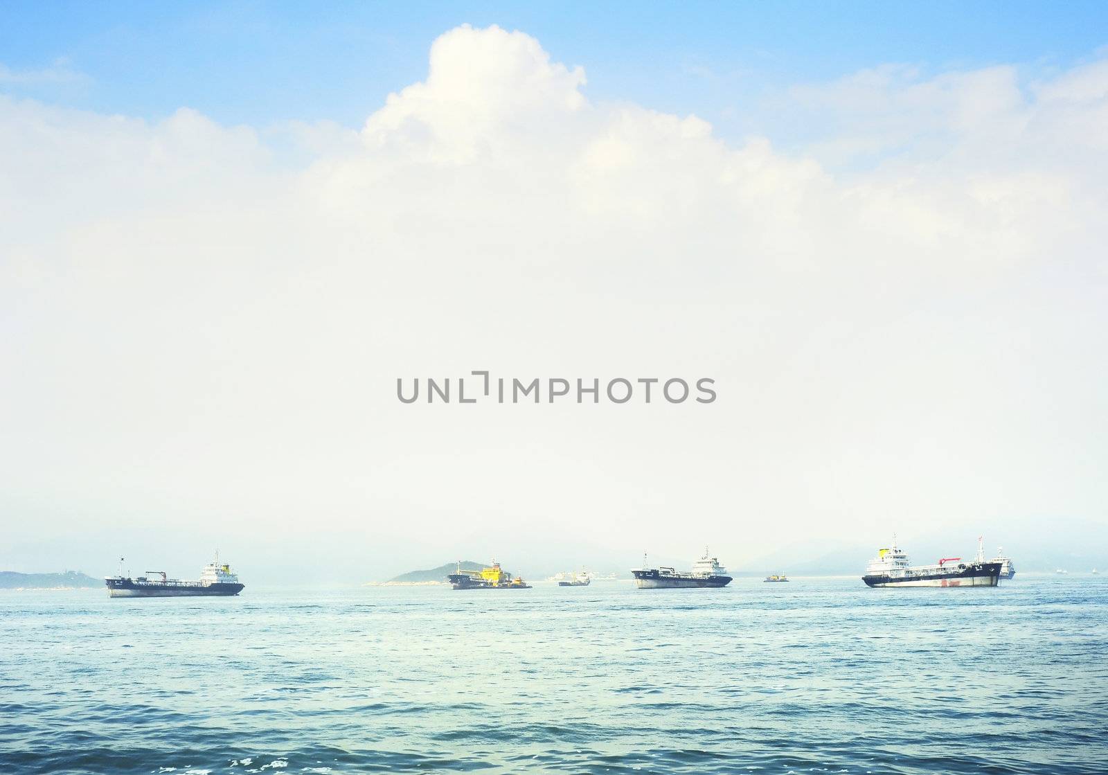 Ships at Hong Kong seashore in the sunshine day